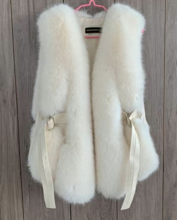 Меховая жилетка