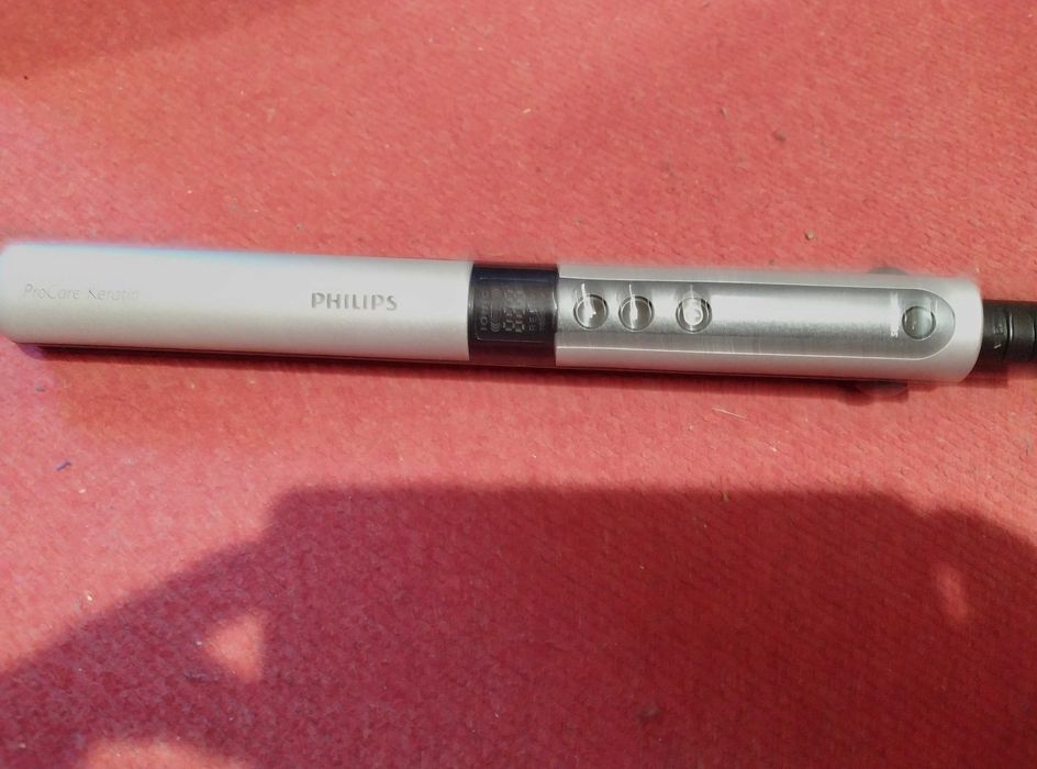 Маша преса Филипс за изправяне на коса