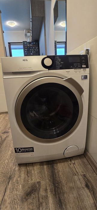 Пералня със сушилня AEG L7WBE69S