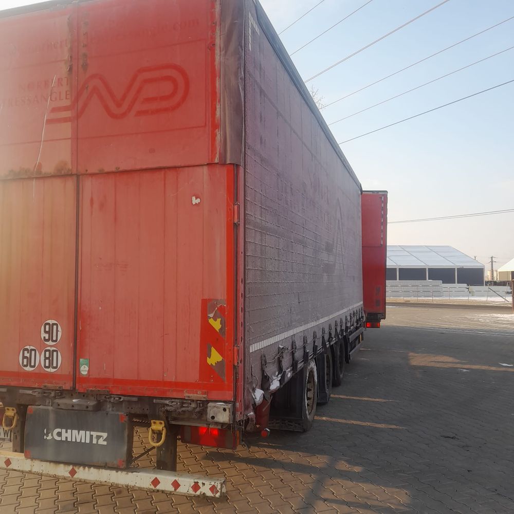 Camioane DAF XF tandem remorci Schmitz