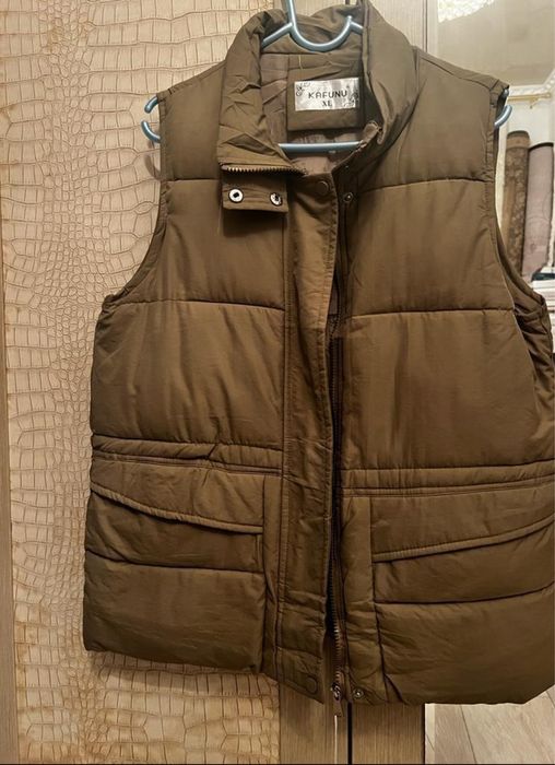 Новый безрукавка