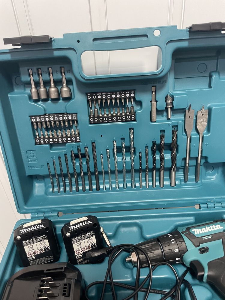 Винтоверт Makita HP333D с куфар пълен комплект накрайници