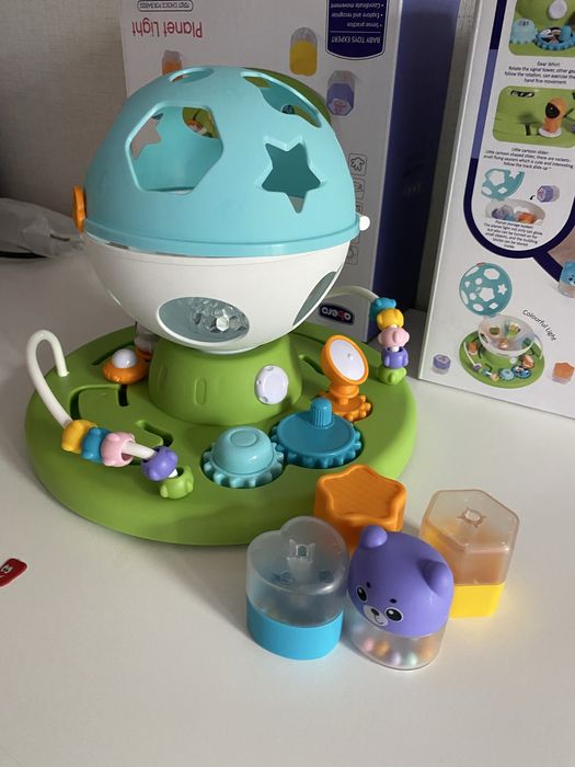 Бебешка играчка сфера Космос - сортер, формички, лабиринт, музика,