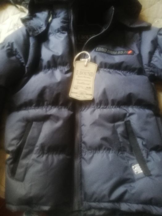 Куртки новые на мальчиков и женская