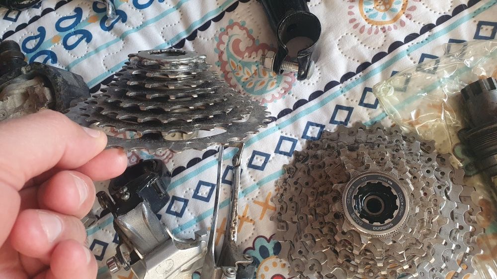 Componente bicicleta butuc pinioane pedale manete monobloc ghidon pipa