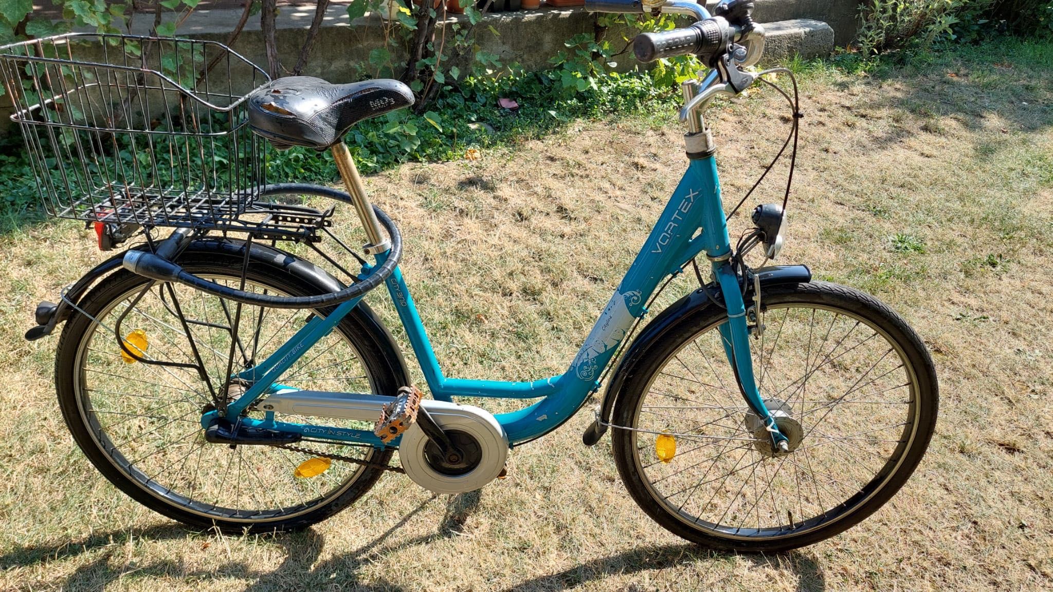 Bicicleta dama, eleganta cu cos