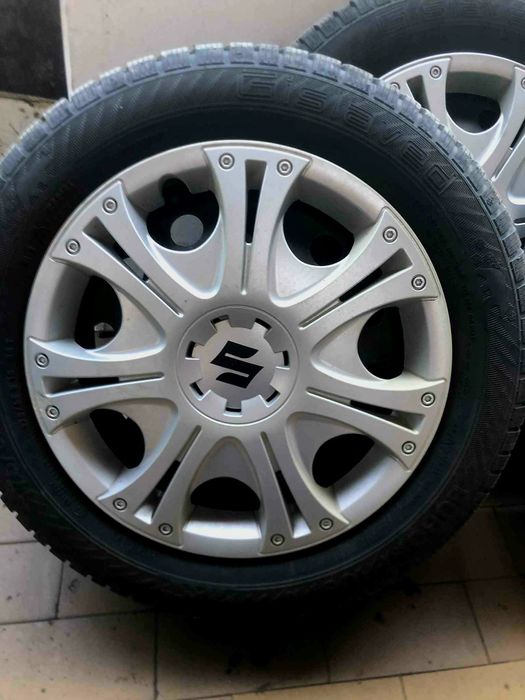 Зимни гуми с джанти и тасове за Suzuki Swift