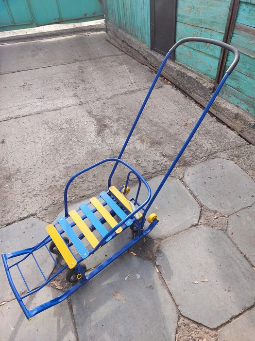 Санки детские на колёсах