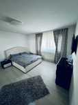 Apartament (1/4 cvadruplex, curte, garaj)