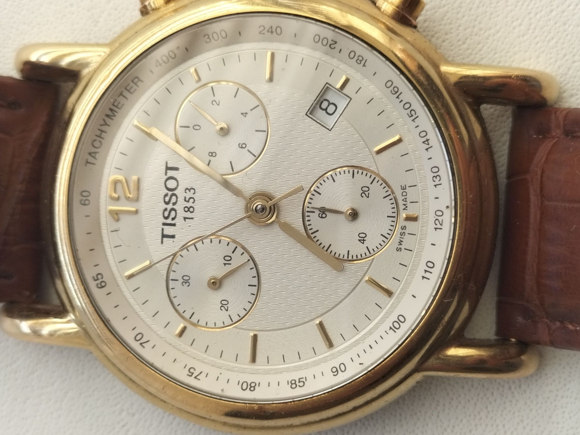 золотые часы TISSOT