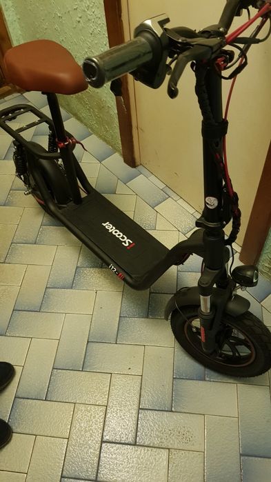Scuter I 12,36 volti,putin folosit(80 km)