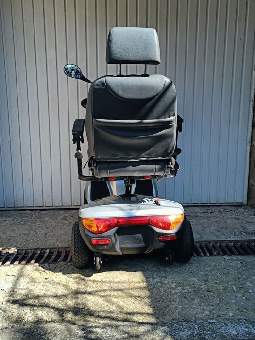 Carucior scuter electric scaun dizabilitati  carut tricieleta handicap