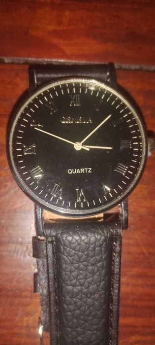 Часовник  Geneva кварц унисекс нов