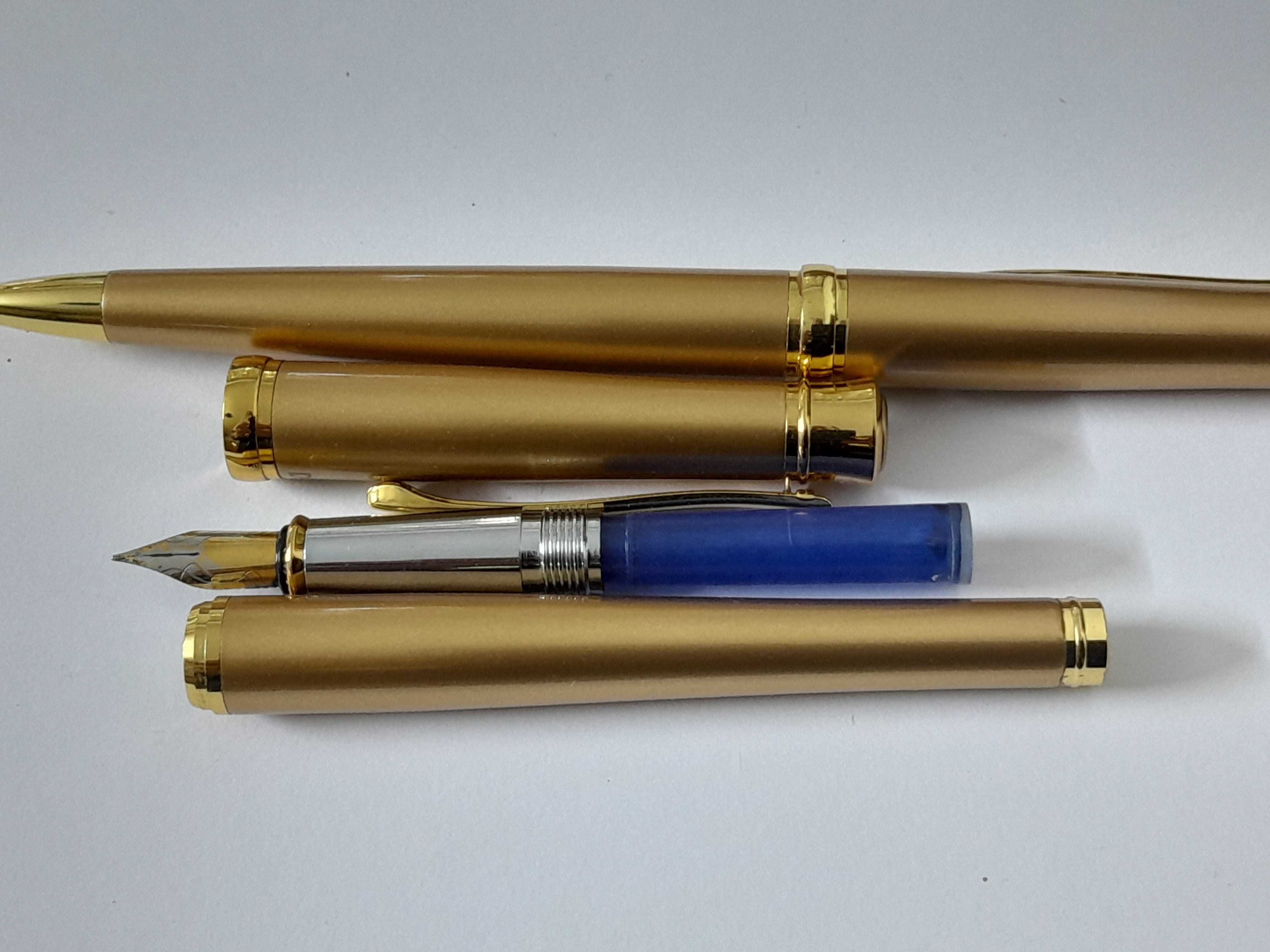 Set nou: stilou și pix Daco, peniță și elemente placate aur