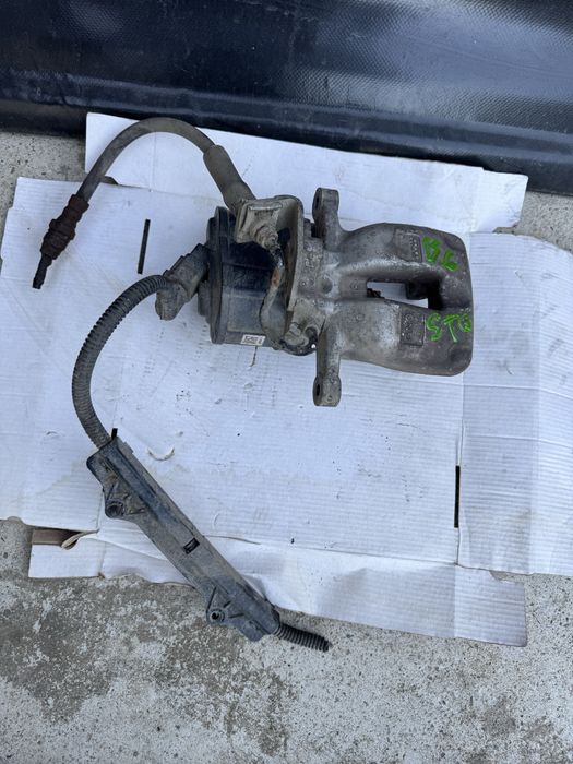 Etrier cu motoras electric stanga spate pt vw passat b6