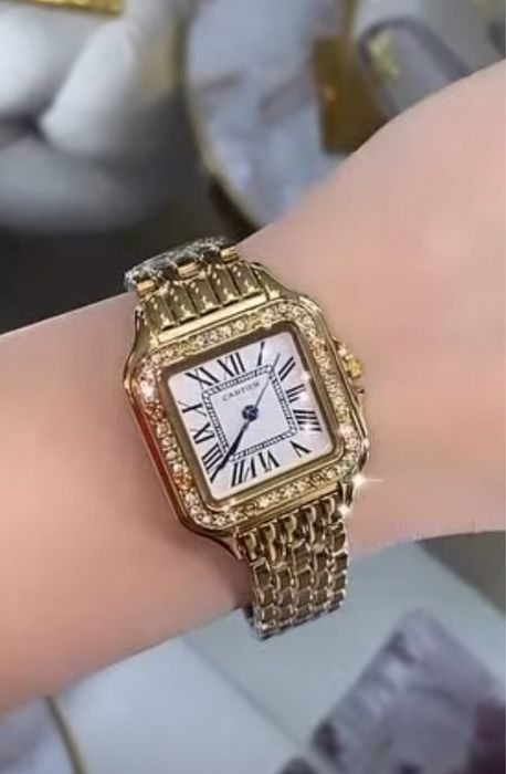 Часы Cartier.