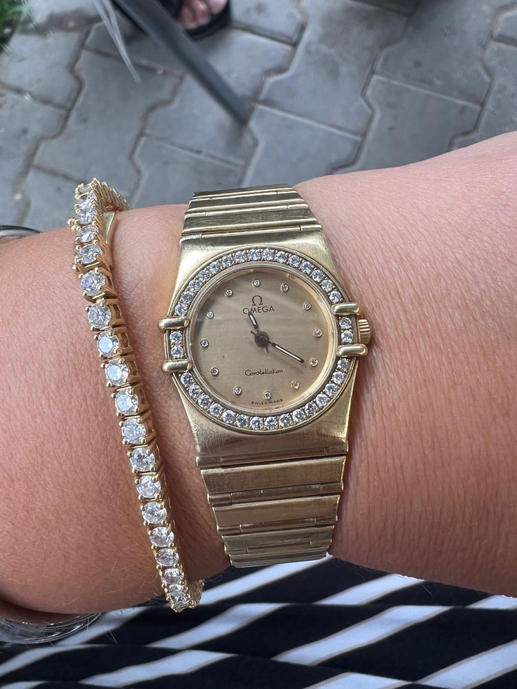 Omega Constelation aur 18 k cu diamante Preț de aur