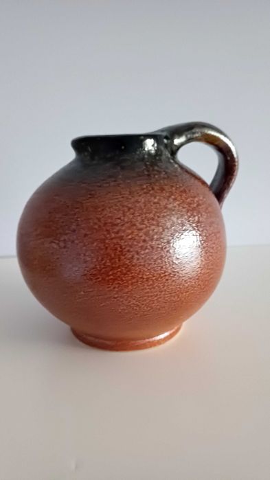 Керамична кана 16см с една дръжка.