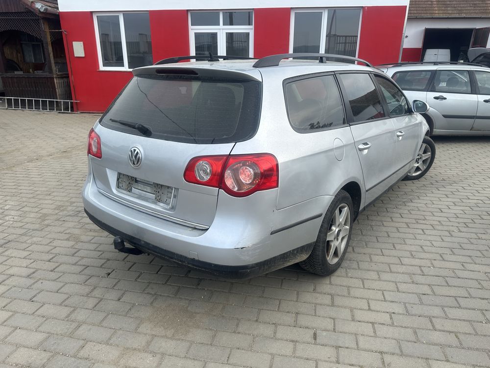 Piese Passat 2.0 Tdi BMW far capota