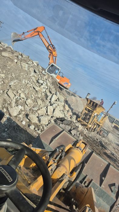 Beton concasat utilizabil ca  și strat suport pe strada sau parcare.