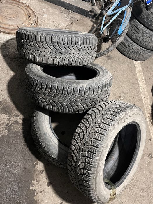 Продам зимние шины 235 R18 70 bridgestone blizzak spike 01