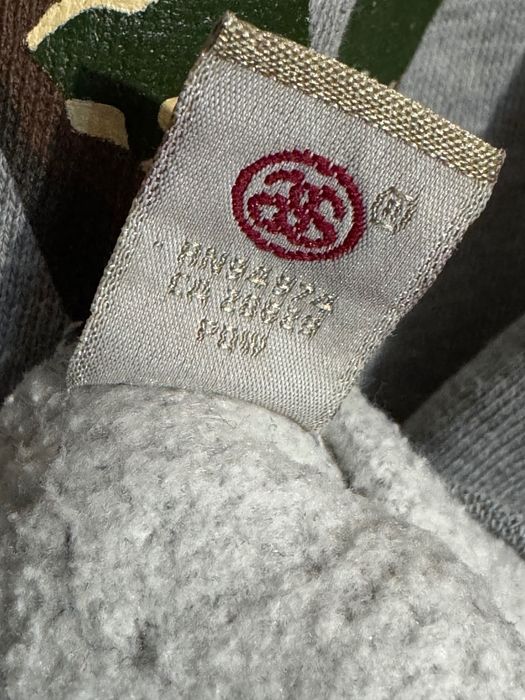 Stussy Camo Graphic Hoodie.