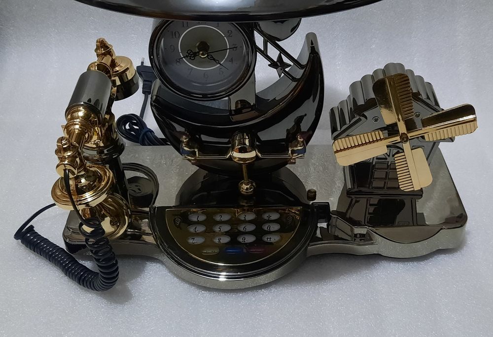 Telefon fix cu veioză, ceas și cutiuță muzicală