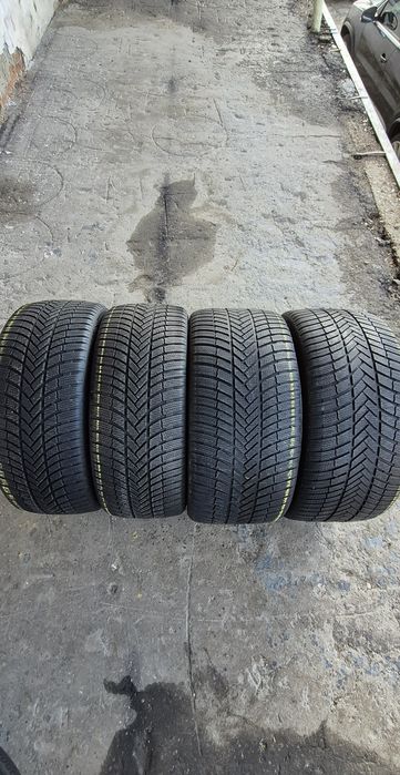 4 anvelope iarna Bridgestone,fata 275/40/21,spate 315/35/21.Pret/buc