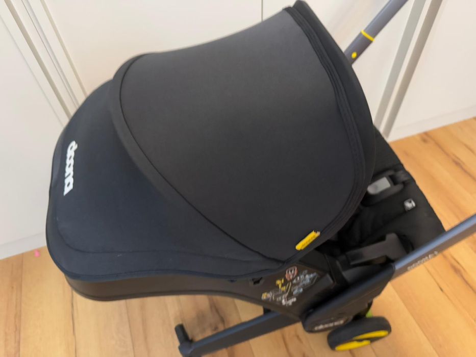 Scoica auto Doona i i-Size black transformabila in carucior
