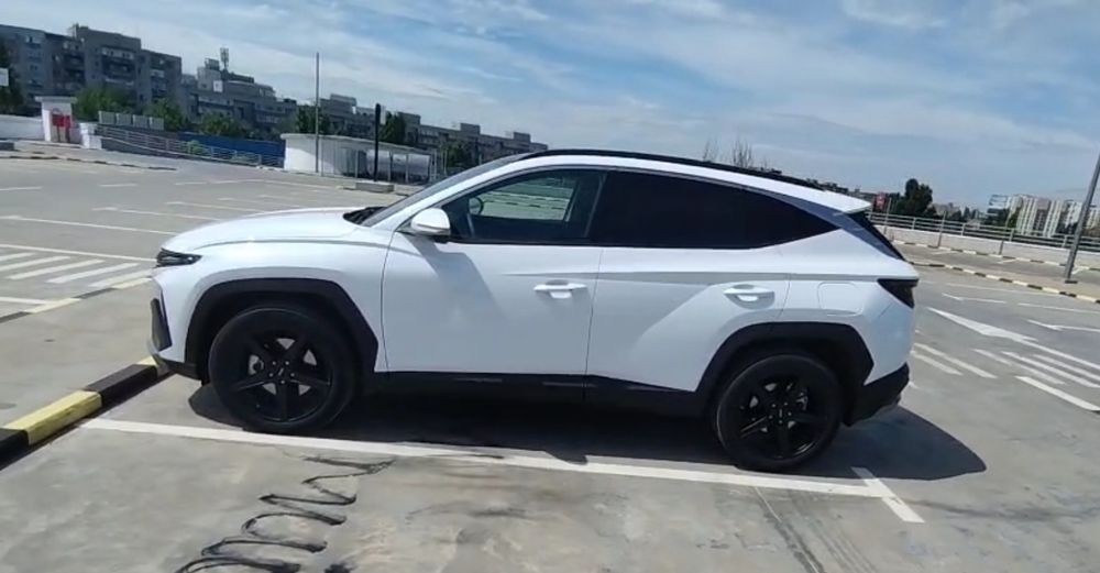 Hyundai Tucson 215CP Hybrid 4WD 6AT Luxury + set roti iarnă aliaj