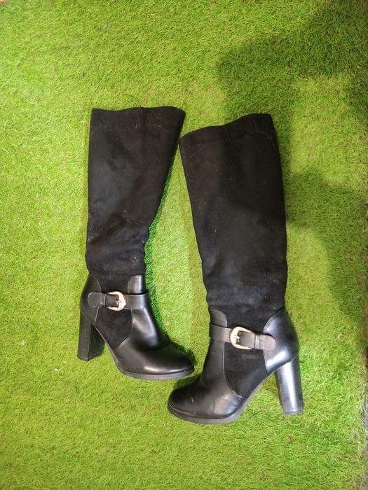 Зимние сапоги на каблуках