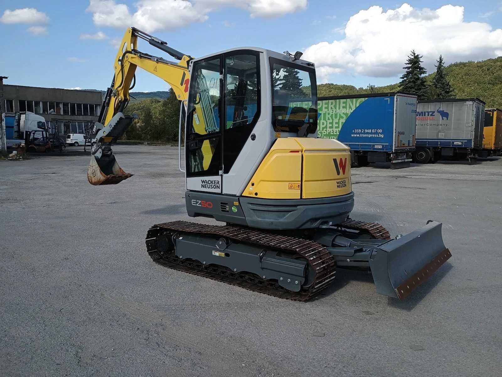 Багер Wacker Neuson