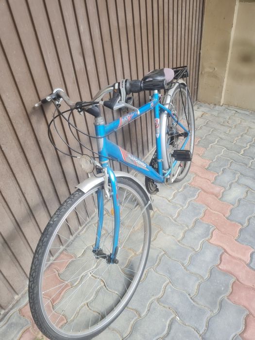 Vand bicicleta cu roti pe 28