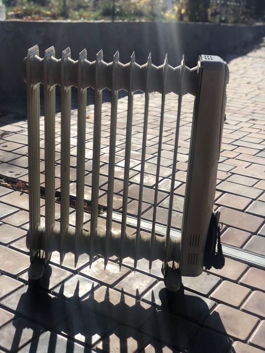 Масляный обогреватель.