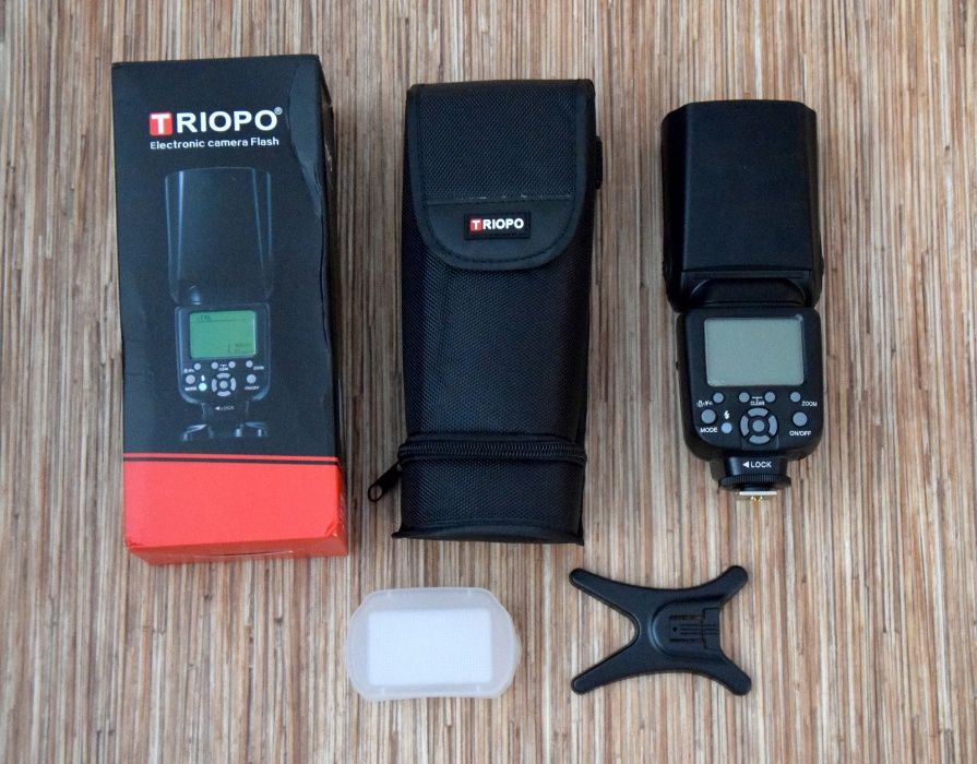 Продам новую вспышку Triopo TR-988 для Nikon и Canon