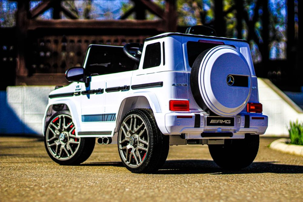 Masinuta electrica pentru copii Mercedes G63 AMG 2x25W NOUA #ALB