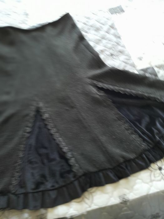 Елегантен дамски костюм.