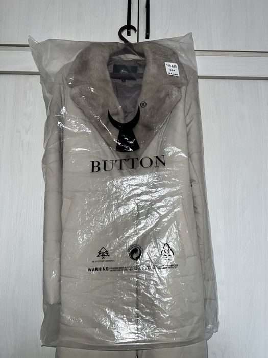 Пуховик почти новый