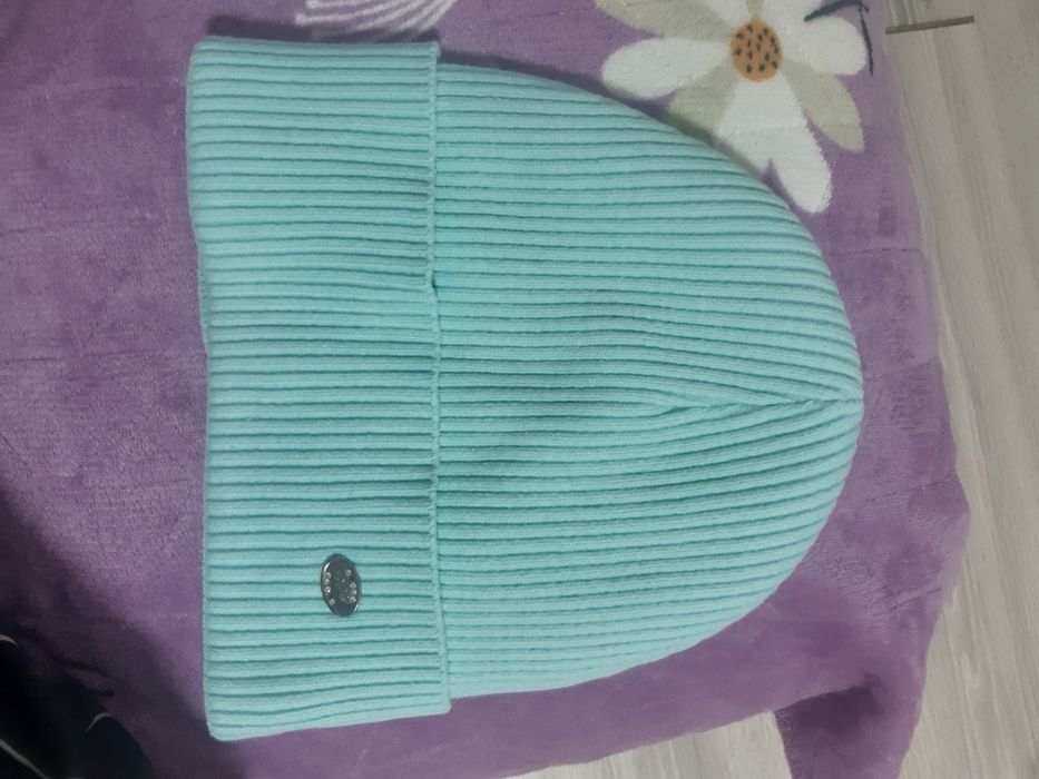 Продам зимнию шапку