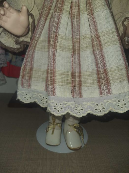 Păpușă de porțelan