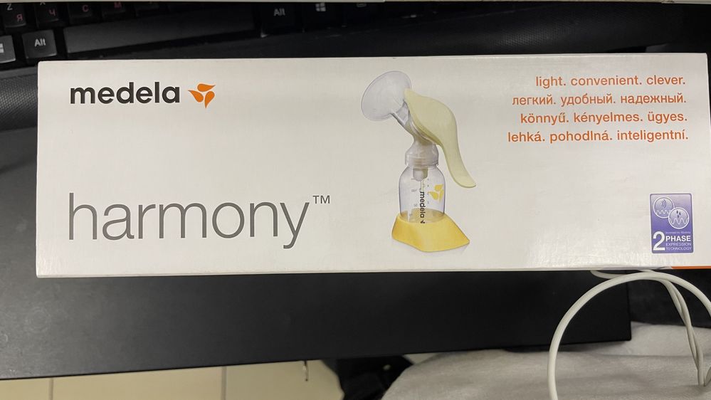 Молокоотсос Medela