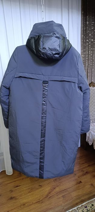 Пуховик аёллар пальтоси холати енгиде