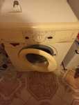 Mașină de spălat rufe marca Wirpool