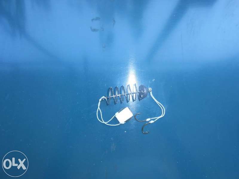 Вързани рибарски пружини , хранилка