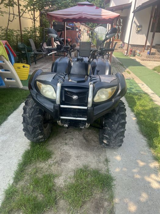 Atv 400 cm. cu grup pe spate