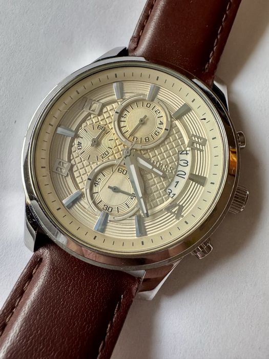 Lot 7 ceasuri: Timex (1), Guess (1), Fossil (4), Swach (1)