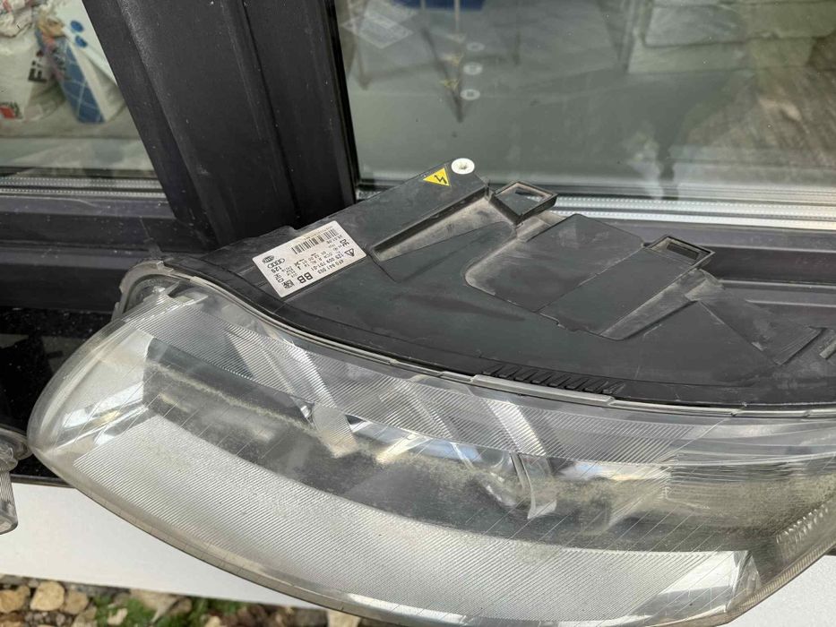 Far Audi A6 C6 2005 - 2008 faruri xenon Stanga dreapta