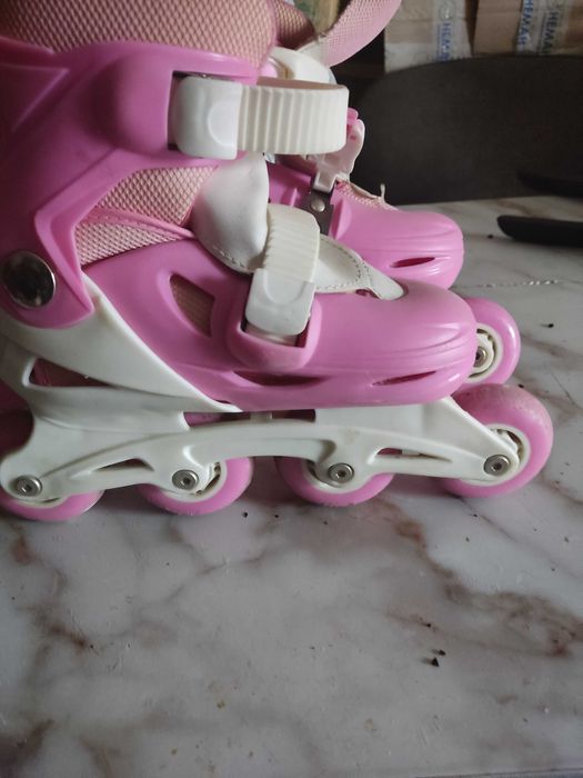 Роликовые коньки