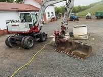 Excavator pe roti Takecuhi TB175 W impecabil!!