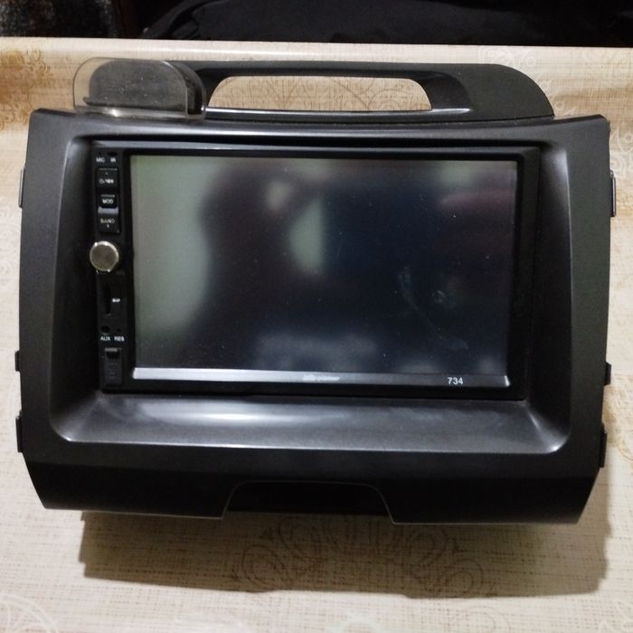 Продам штатную магнитолу на Кия спортейдж
